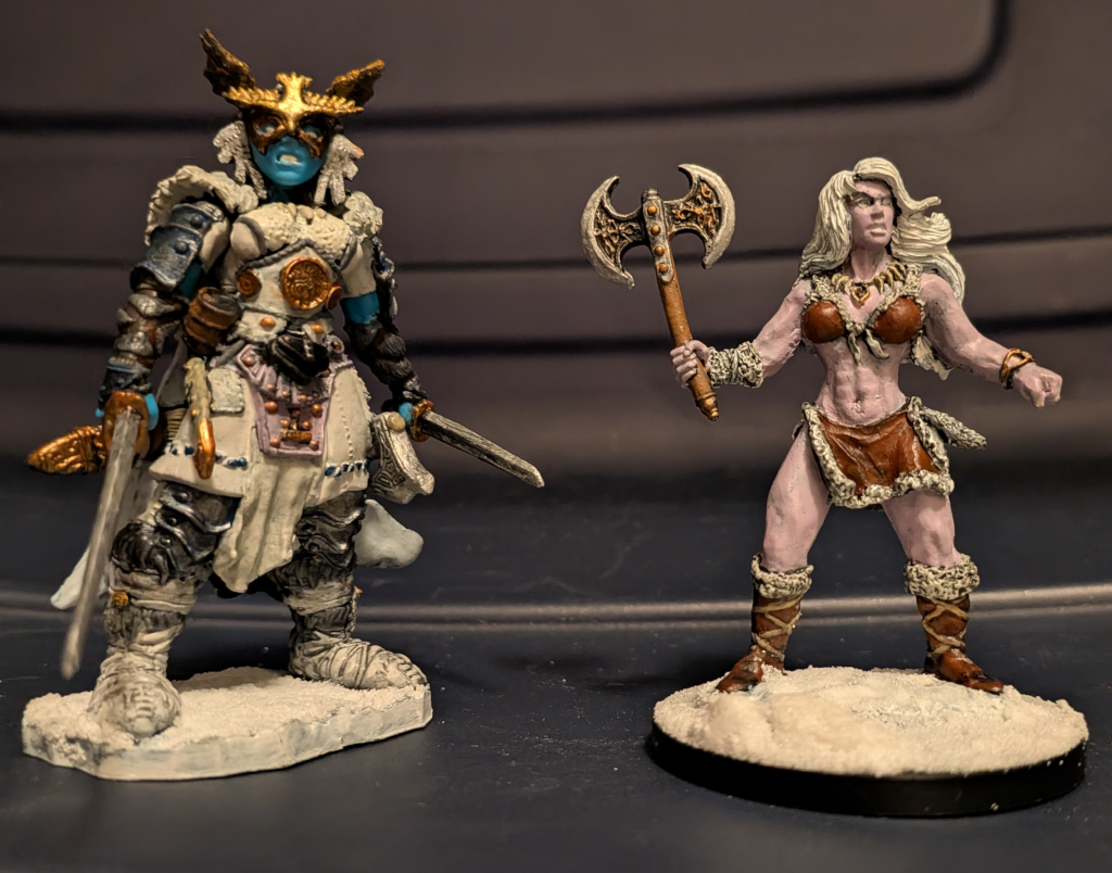 Reaper Miniatures Frost Giant Heroine next to Frulla Krung