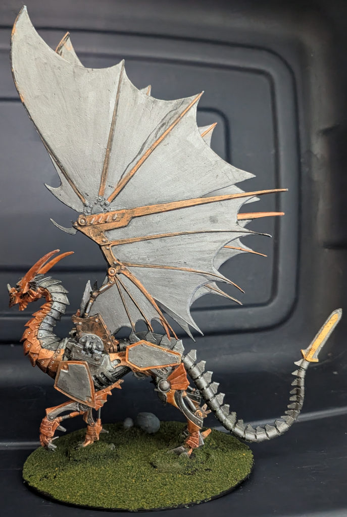 Wyrmgear the clockwork dragon Left view of clockwork dragon